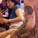 OUTRAGE: Resurfaced photo shows young child putting money in burlesque dancer’s underwear