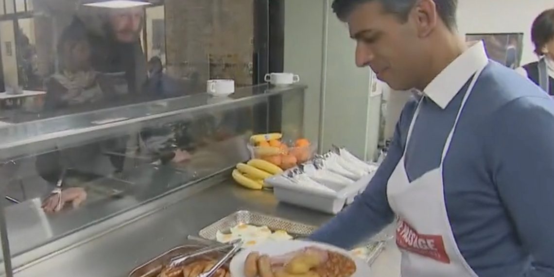 Cringe: British PM Serving Meals at Homeless Shelter Asks Homeless Man, “Do you Work in Business?” “No, I’m Homeless”