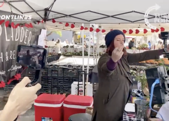 MUST WATCH: Woman triggered in LA by anti-child sex trafficking march throws bucket of water on videographer