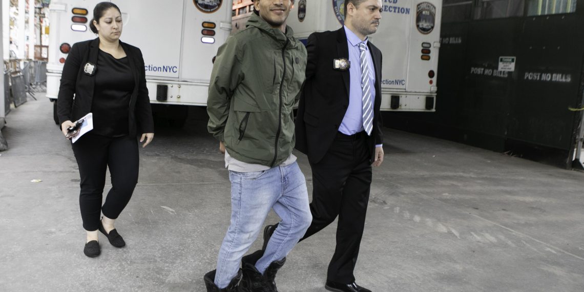 Venezuelan migrant with ties to Tren de Aragua grins after being arrested in lewd robbery of NYC prosecutor